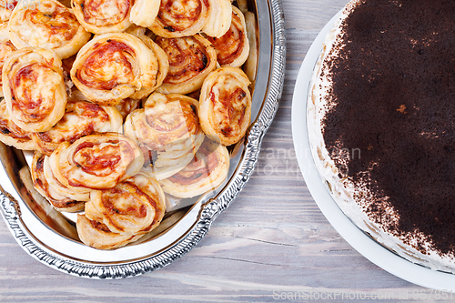 Image of homemade bacon snail like Hawaiian pizza