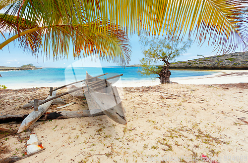 Image of abandoned boat in sandy beach in madagascar