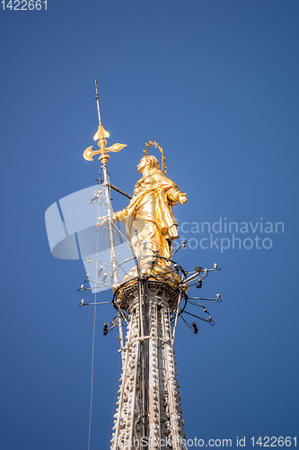 Image of golden Madonna statue at Cathedral Milan Italy