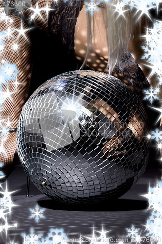 Image of fishnet stockings and disco ball