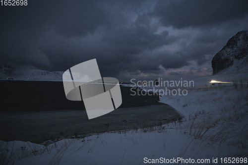 Image of norway coast in winter with snow bad cloudy weather