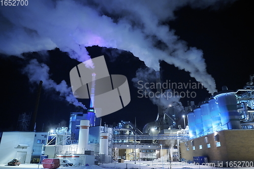 Image of Factory at Night Air Pollution From Industrial Smoke