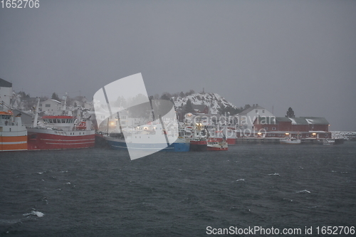 Image of Traditional Norwegian fisherman\'s cabins and boats