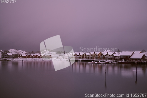 Image of Traditional Norwegian fisherman\'s cabins and boats