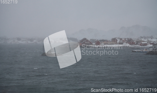 Image of Traditional Norwegian fisherman\'s cabins and boats