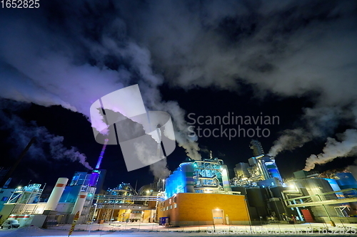 Image of Factory at Night Air Pollution From Industrial Smoke