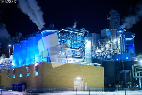 Image of Factory at Night Air Pollution From Industrial Smoke