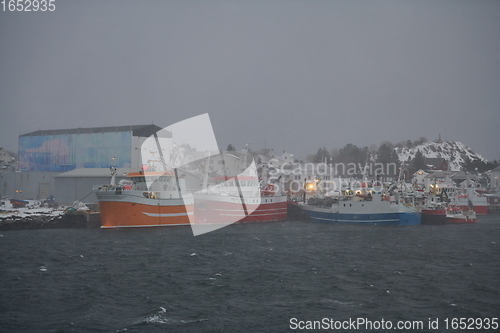 Image of Traditional Norwegian fisherman\'s cabins and boats