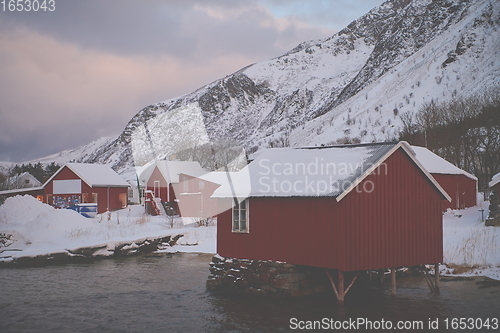 Image of Traditional Norwegian fisherman\'s cabins and boats