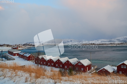 Image of Traditional Norwegian fisherman\'s cabins and boats