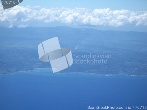 Image of ocean and land viewed from a plane