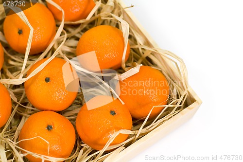 Image of tangerines with straw