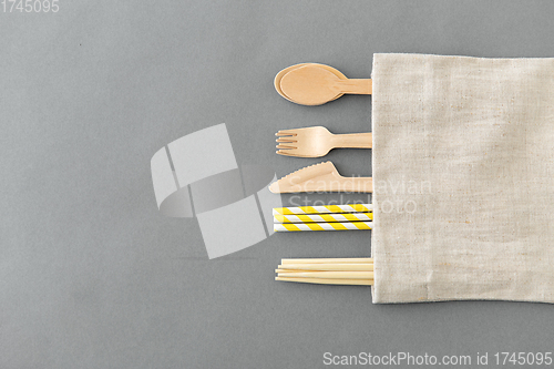 Image of wooden spoon, fork, knife, straws and chopsticks