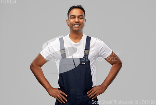 Image of happy smiling indian worker or builder