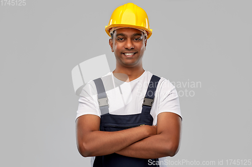 Image of happy indian worker or builder with crossed arms