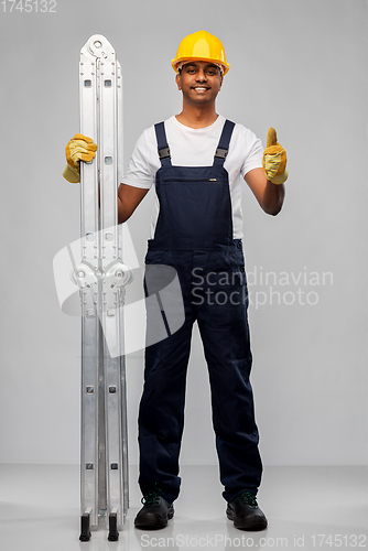 Image of happy indian builder with ladder showing thumbs up