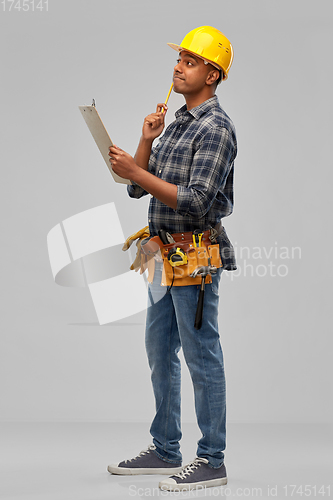 Image of thinking builder with clipboard and pencil