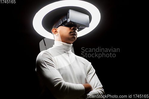 Image of man in virtual reality headset or vr glasses