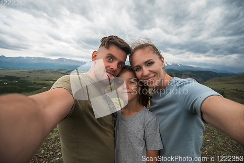 Image of Selfie of family in mountain