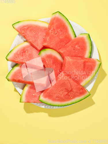 Image of watermelon slices on white plate