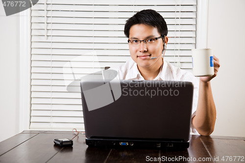 Image of Working asian entrepreneur