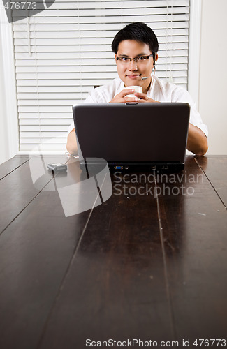 Image of Working asian entrepreneur