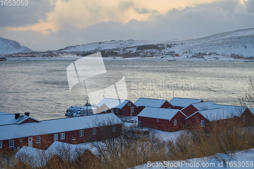 Image of Traditional Norwegian fisherman\'s cabins and boats