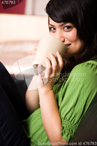 Image of Asian girl with coffee cup