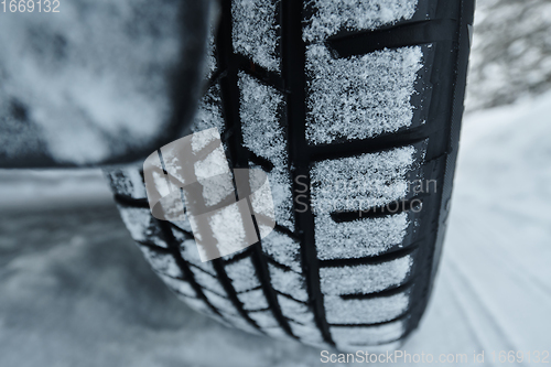 Image of offroad suv car on icy winter north road