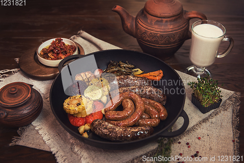 Image of Grilled sausages with vegetables