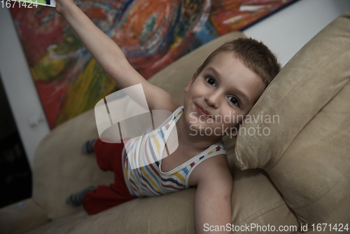 Image of Little boy child playing with creative toys