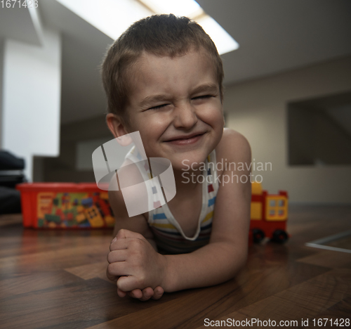 Image of Little boy child playing with creative toys