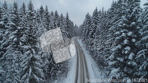 Image of country road in winter season with fresh snow