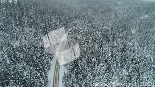 Image of country road in winter season with fresh snow