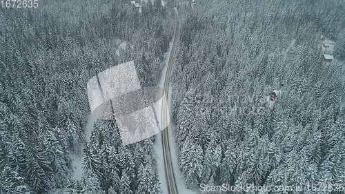 Image of country road in winter season with fresh snow