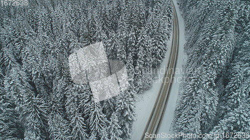 Image of country road in winter season with fresh snow