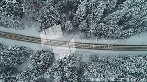 Image of country road in winter season with fresh snow