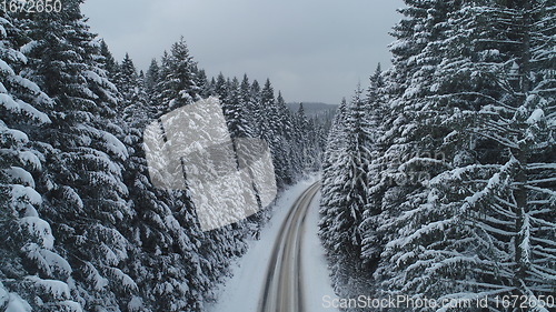 Image of country road in winter season with fresh snow