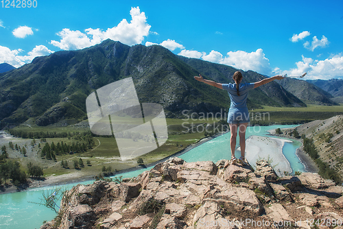 Image of Woman taking selfie on mobile phone