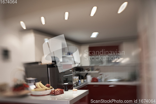 Image of kitchen with trendy red desigh