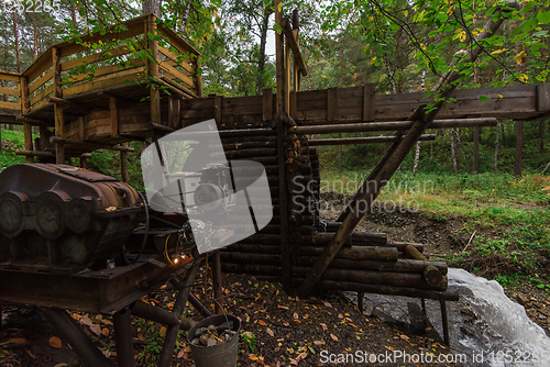 Image of Rustic watermill with wheel