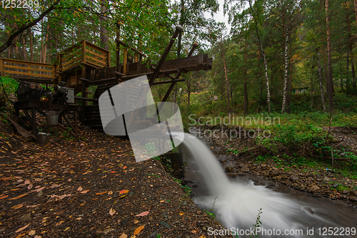 Image of Rustic watermill with wheel