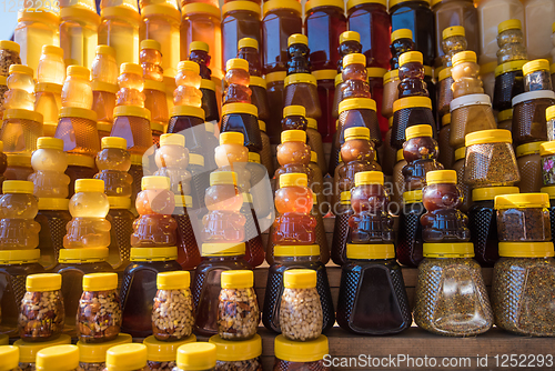 Image of A lot of jars with natural organic honey