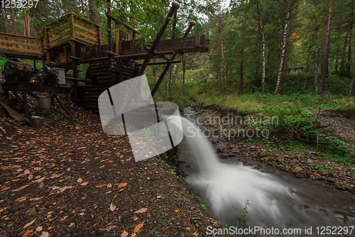 Image of Rustic watermill with wheel