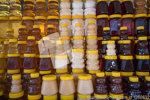 Image of A lot of jars with natural organic honey