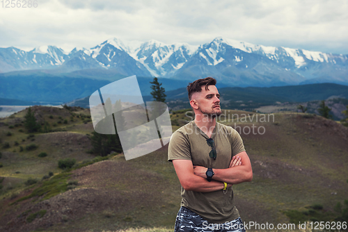 Image of Relaxing man in Kurai steppe on North-Chui ridge