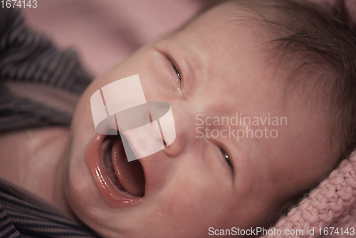 Image of newborn baby crying and screaming