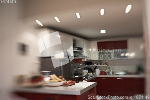 Image of kitchen with trendy red desigh