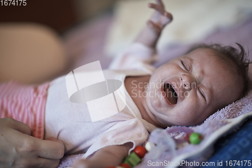 Image of happy newborn little baby smilling