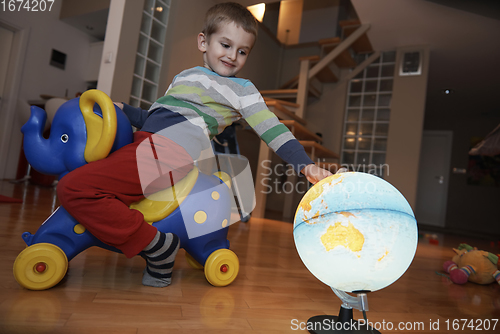 Image of Little boy child playing with creative toys